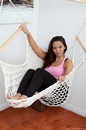 Natural girl Lucie lounges in her hammock